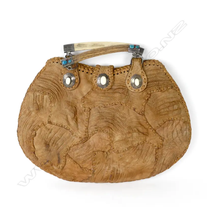 A vintage crocodile skin handbag Image 1++