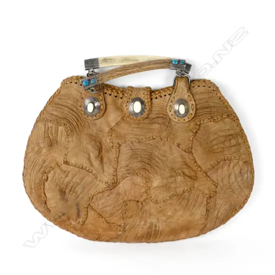 A vintage crocodile skin handbag