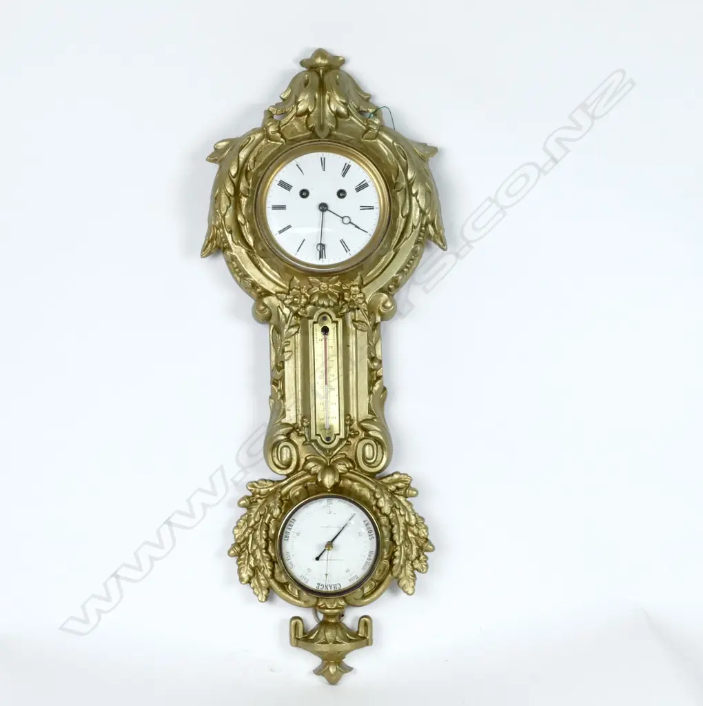 A gilded cast iron framed combination clock/ barometer/thermometer Image 1++