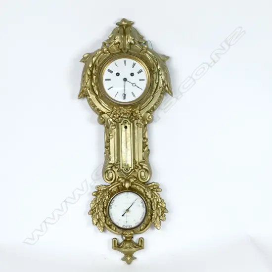 A gilded cast iron framed combination clock/ barometer/thermometer