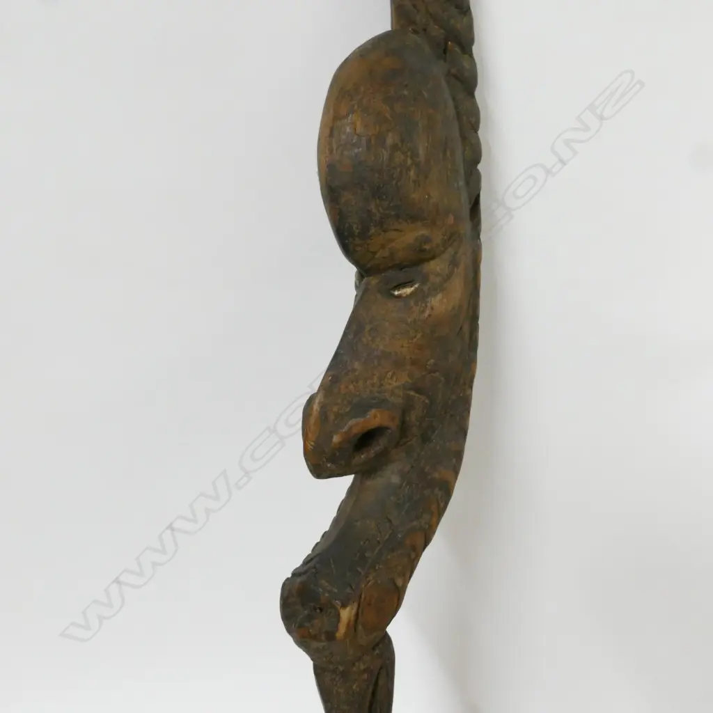 A PNG carved wooden food hook Image 1++