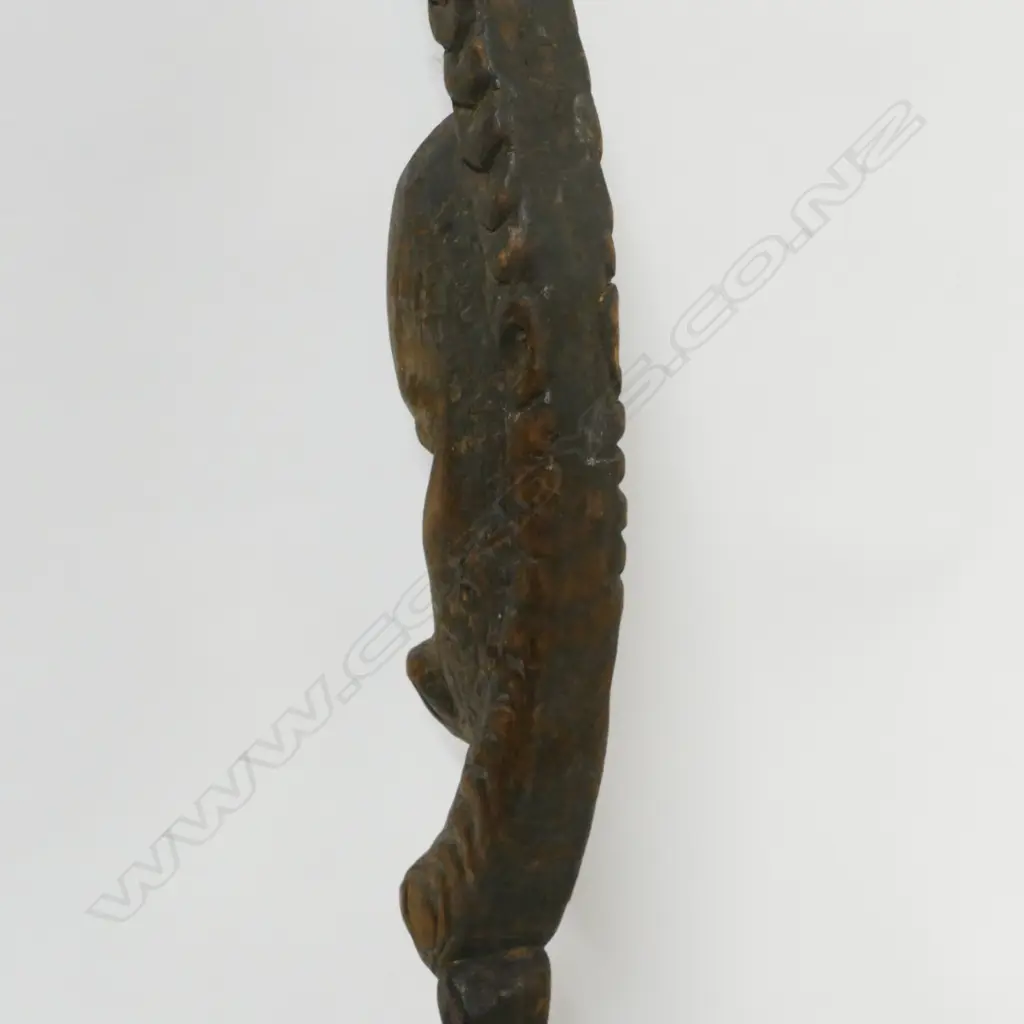 A PNG carved wooden food hook Image 1++