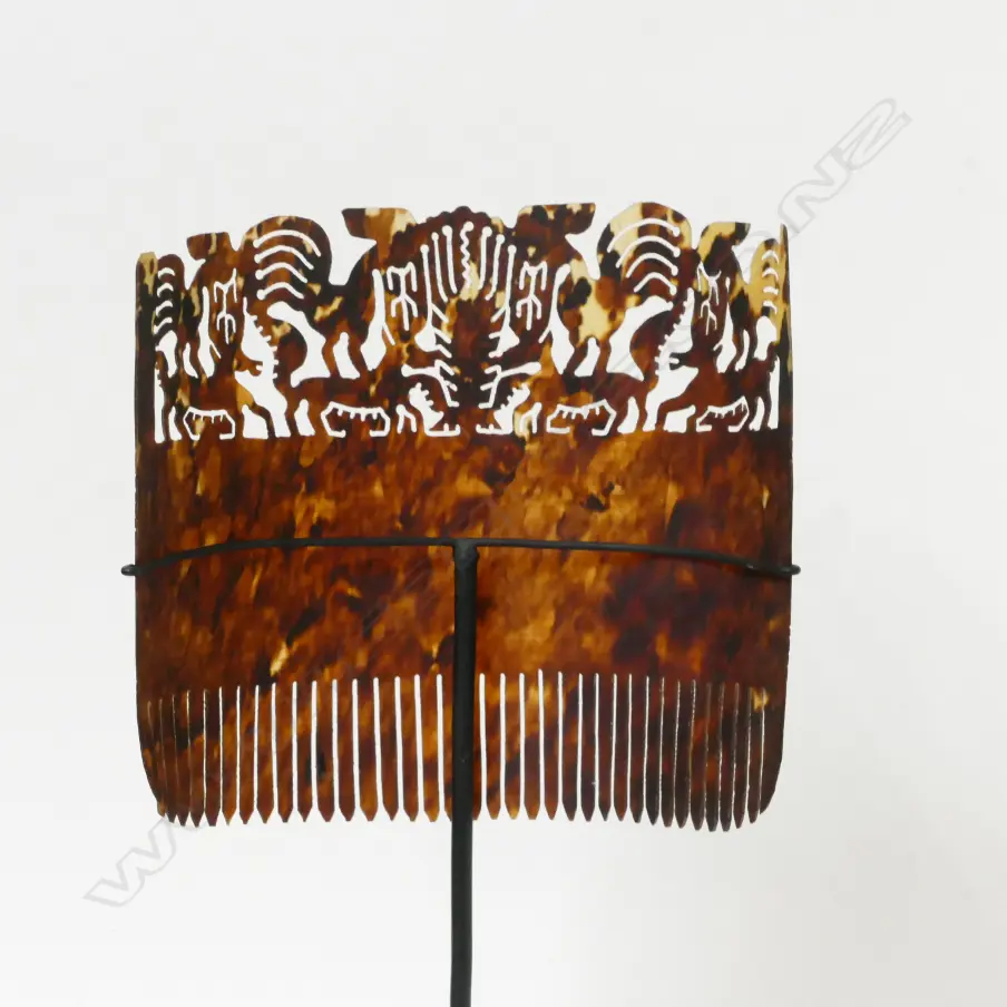 A Pacific tortoise shell hair comb Image 1++