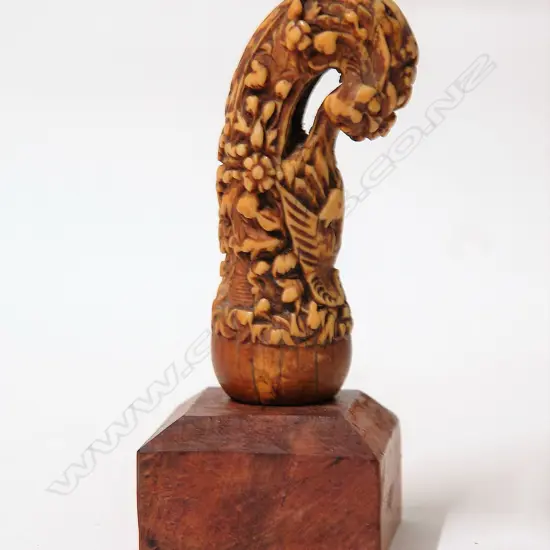 A late 19thC carved ivory Indonesian kris handle