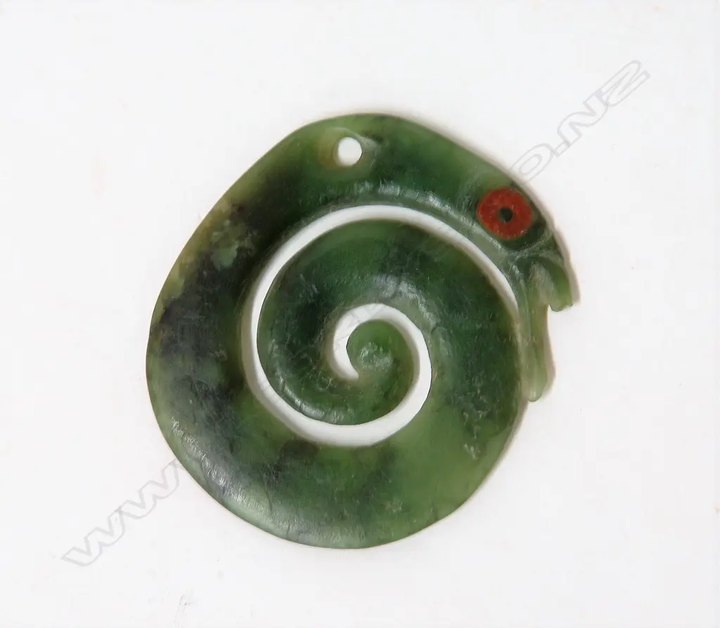 An old Maori pounamu carved manaia koropepe Image 1++