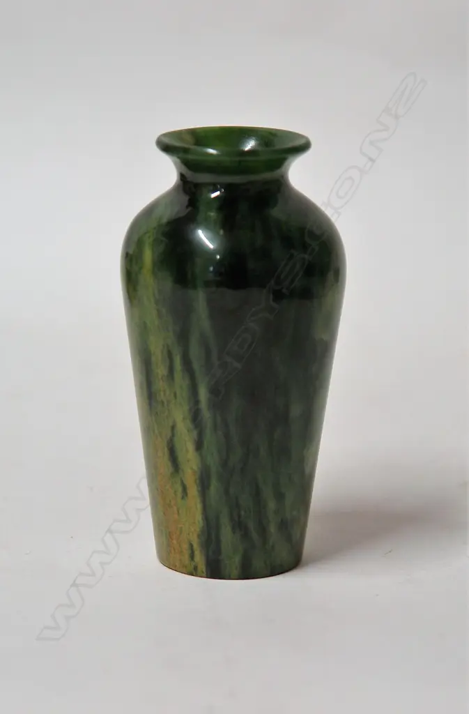 A Marsden Flower pounamu (nephrite) vase by Glen Surgenor Image 1++