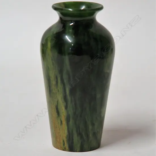 A Marsden Flower pounamu (nephrite) vase by Glen Surgenor