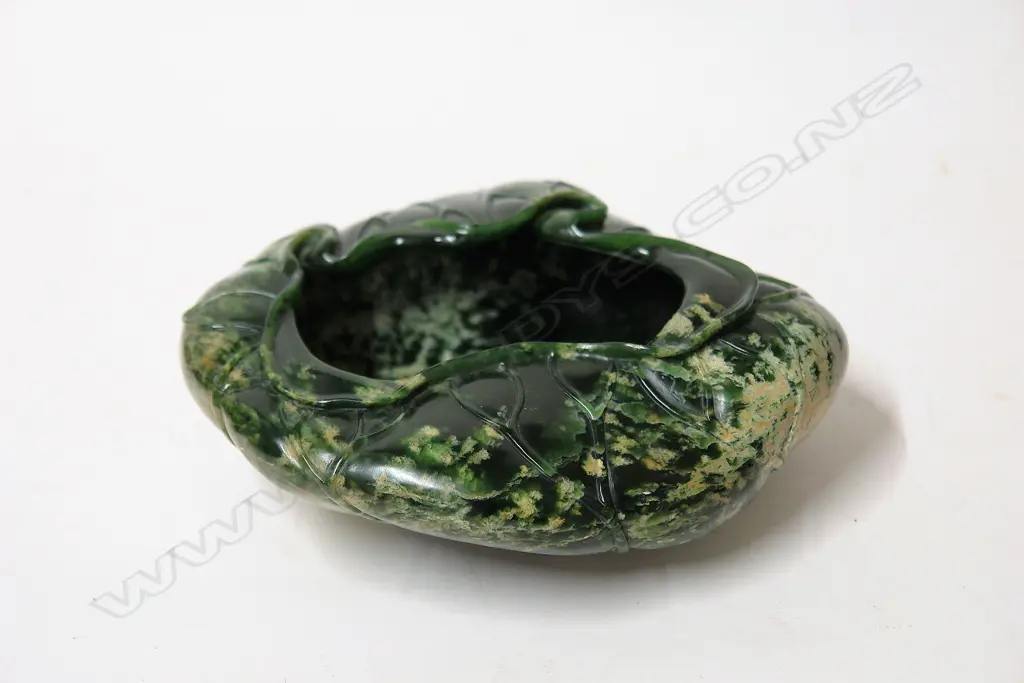 A quality carved Marsden Flower pounamu lotus flower bowl by Richard Anderson Image 1++