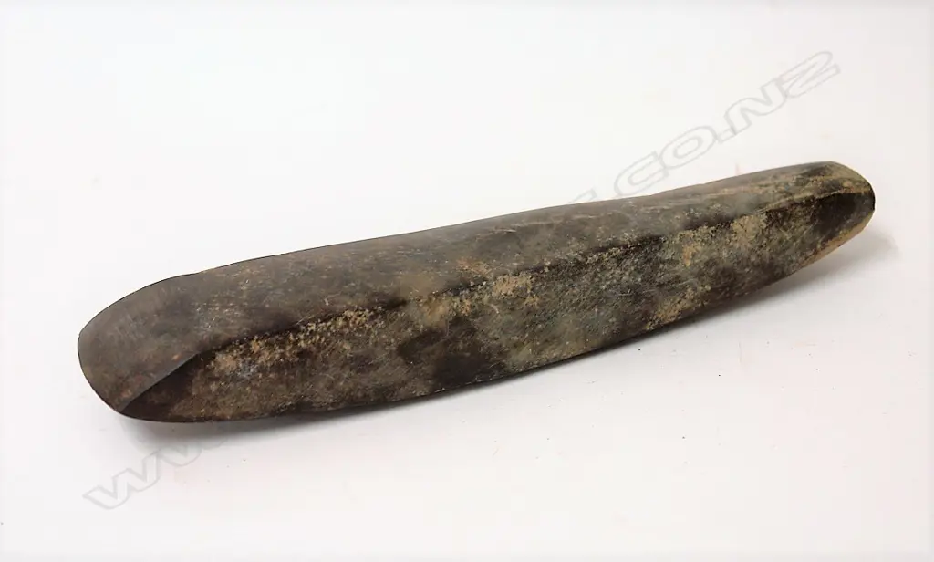 An old Maori stone toki (adze) Image 1++
