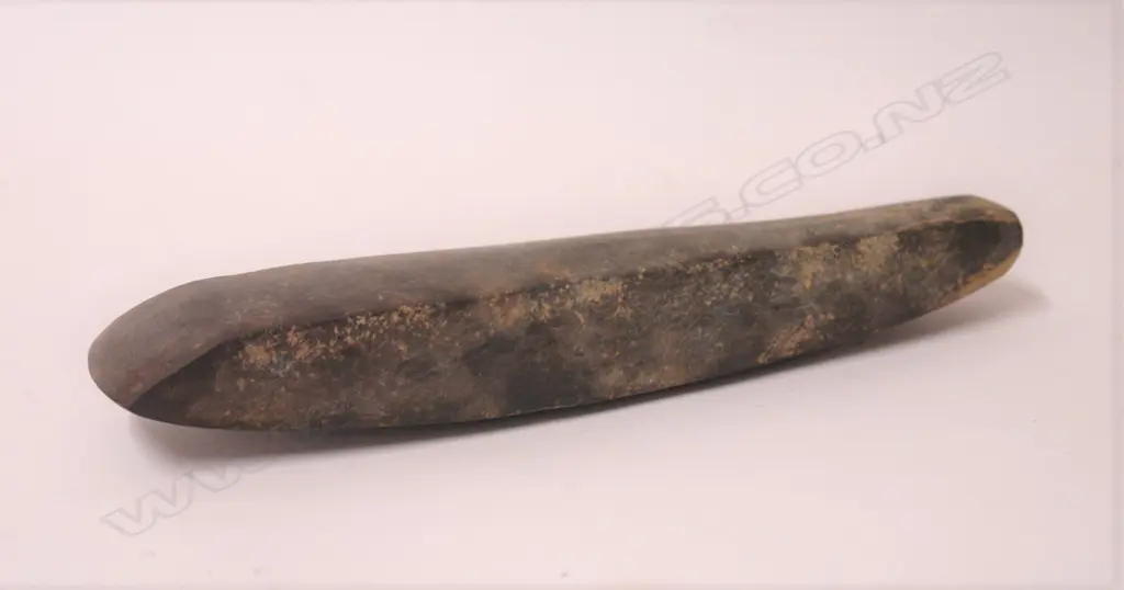 An old Maori stone toki (adze) Image 1++