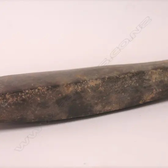 An old Maori stone toki (adze)