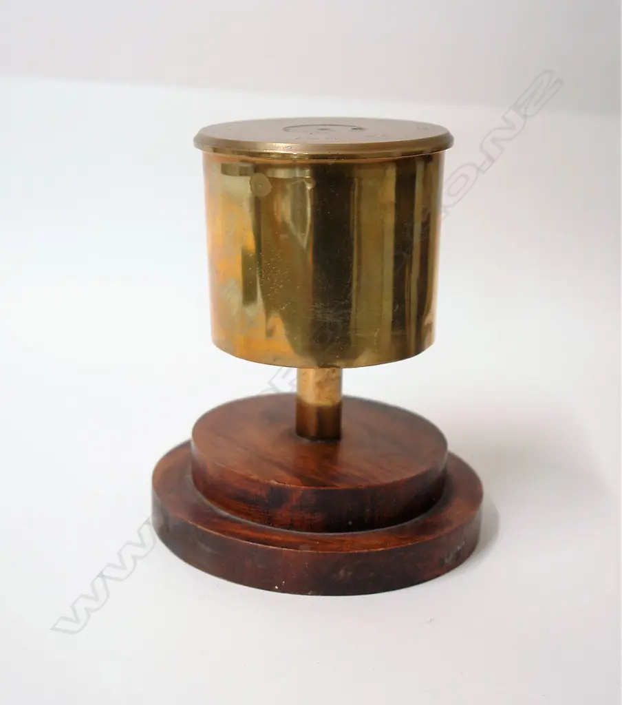 A table bell made from a 1941 brass 3.7" Howitzer shell Image 1++