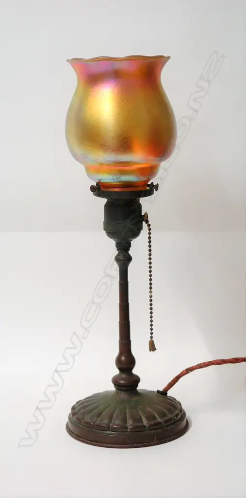 A c1900 Tiffany Studios New York bronze and Favril glass table lamp Image 1++