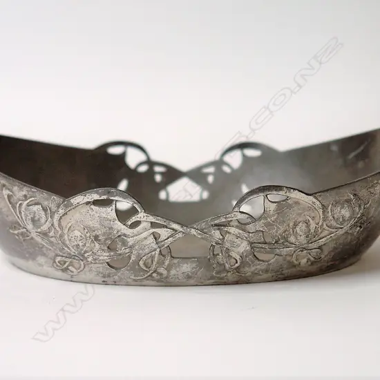 An Archibald Knox design English Pewter dish
