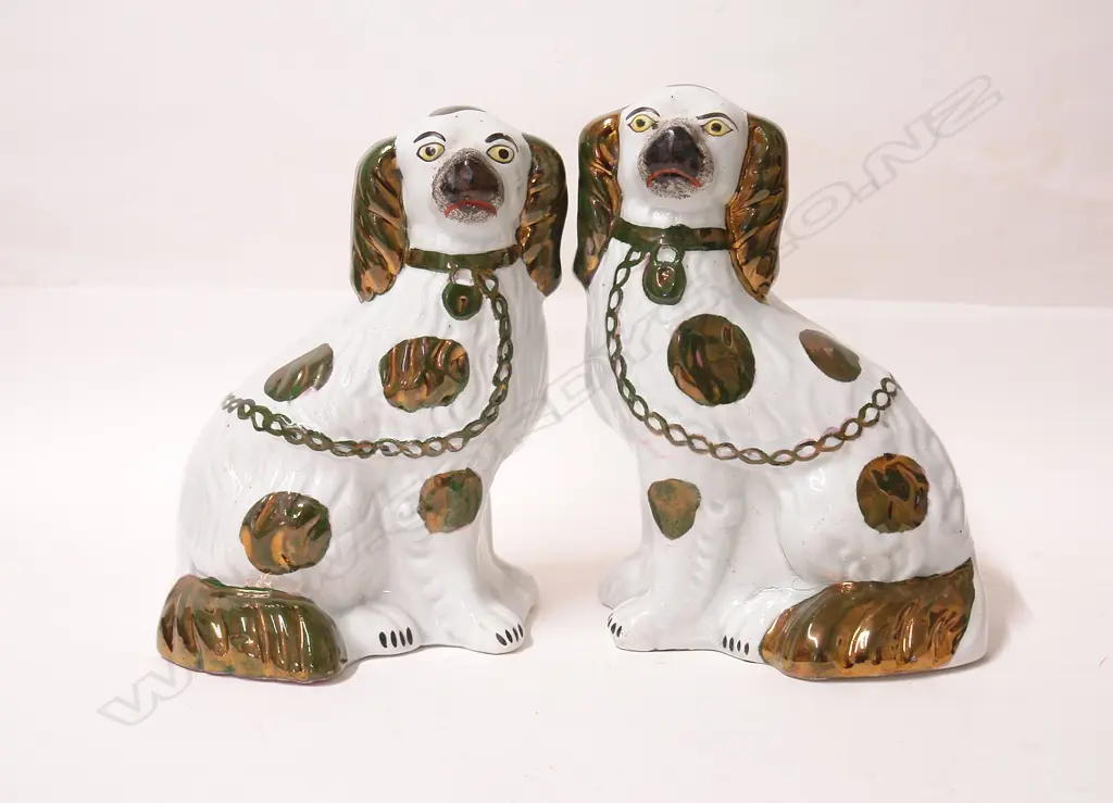 A pair of Victorian Staffordshire seated mantel dogs Image 1++