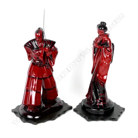 A pair of Royal Doulton flambé figurines