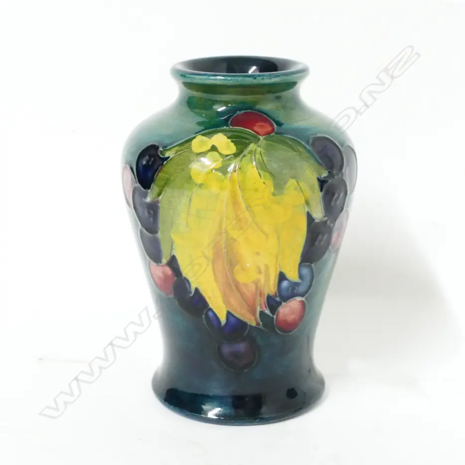 A small William Moorcroft 'Leaf and Berry' vase Image 1++