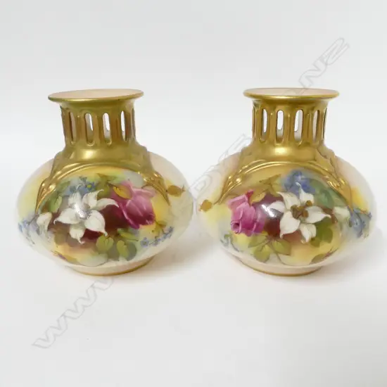 A pair of Royal Worcester vases. Hadley shape H306