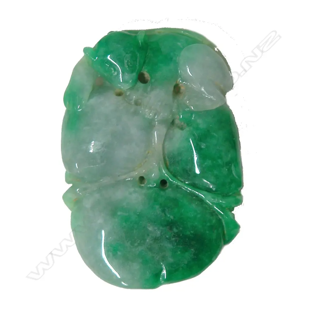 A Chinese pale and vibrant green jade pendant Image 1++