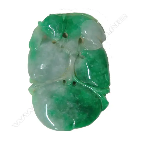 A Chinese pale and vibrant green jade pendant