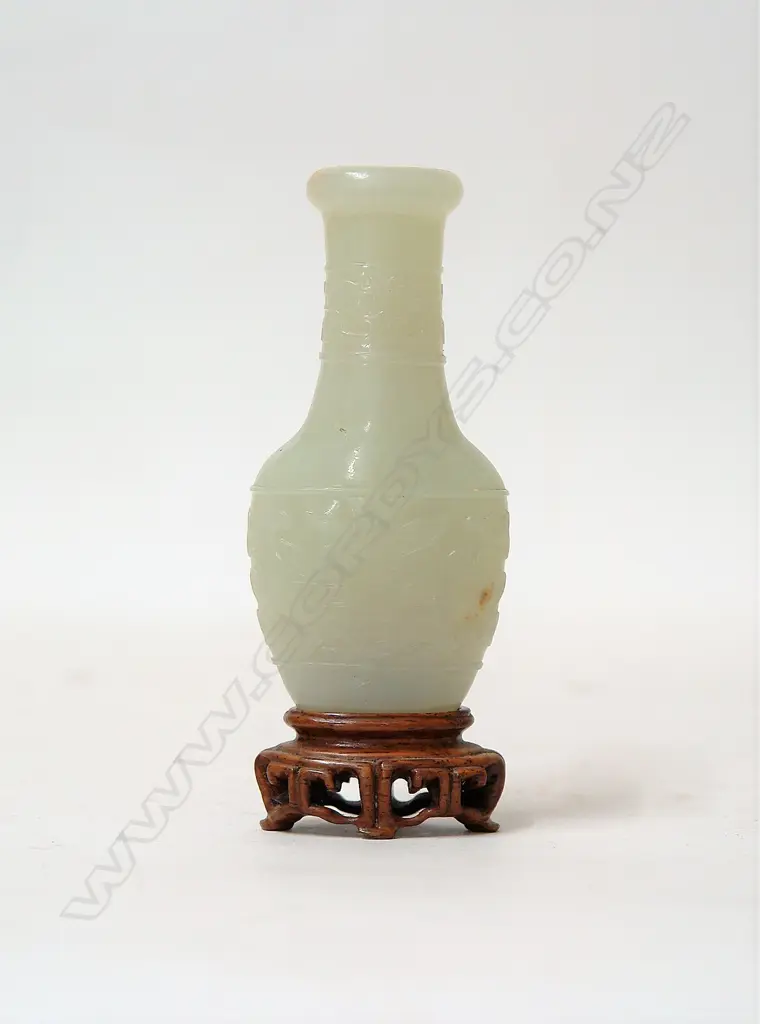 A Chinese pale carved mutton fat jade small bottle vase Image 1++