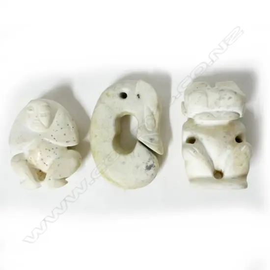 Three archaic style pale jade ornaments