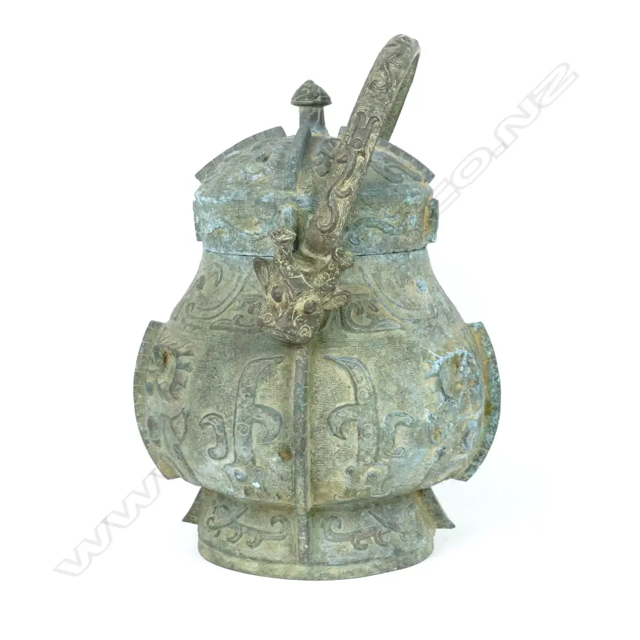 A Chinese bronze ritual wine container (you) Image 1++