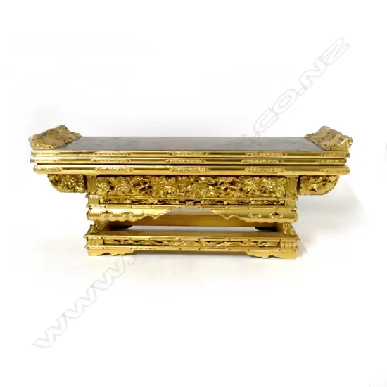 A Chinese carved giltwood shrine stand