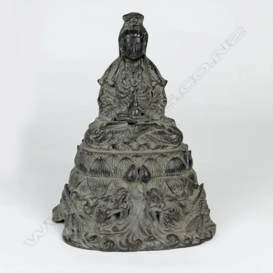 An old Chinese bronze figure of Kuanyin