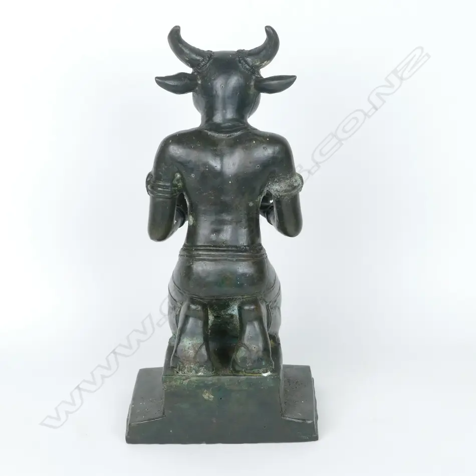 A Sino-Tibetan bronze statuette of a bull headed deity Image 1++