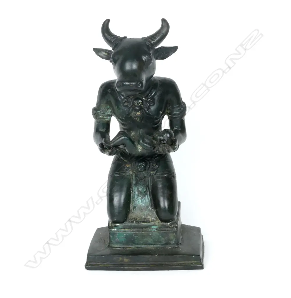 A Sino-Tibetan bronze statuette of a bull headed deity Image 1++