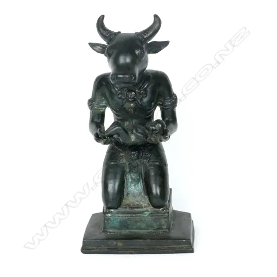 A Sino-Tibetan bronze statuette of a bull headed deity