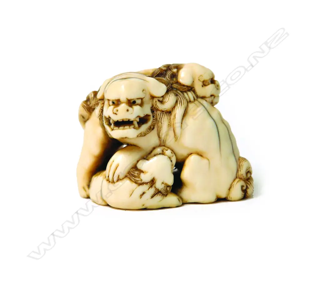 A 19thC Japanese finely carved ivory shishi figure group netsuke Image 1++