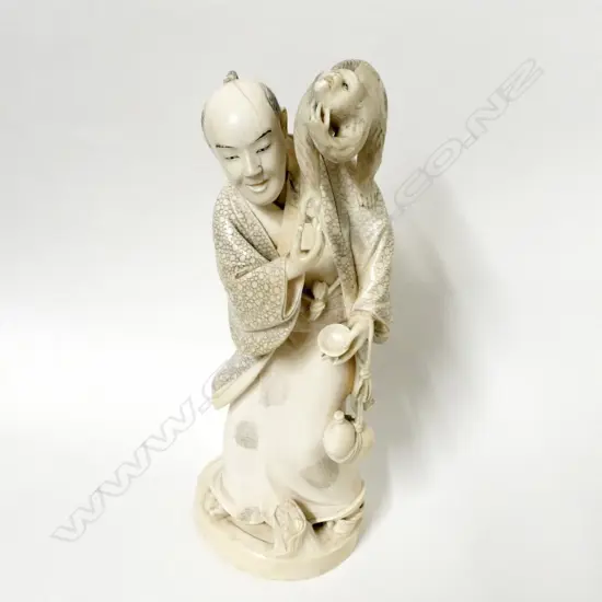 A large and impressive Japanese carved solid ivory figure