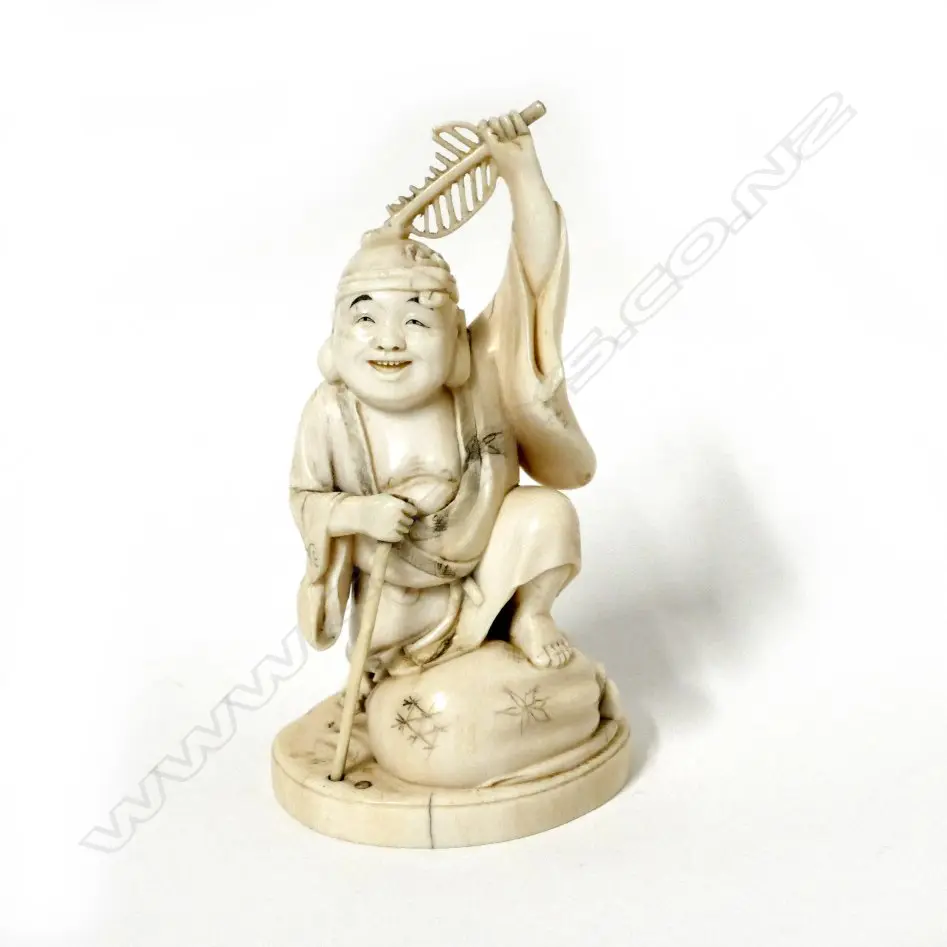 A Japanese carved ivory figure of Ebisu Image 1++