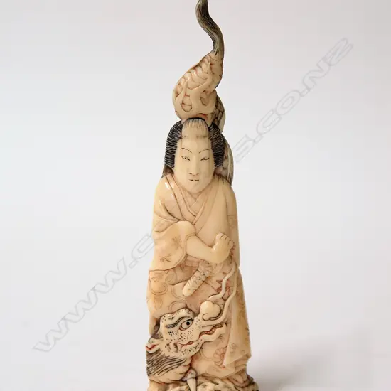An old Japanese marine ivory carved okimono