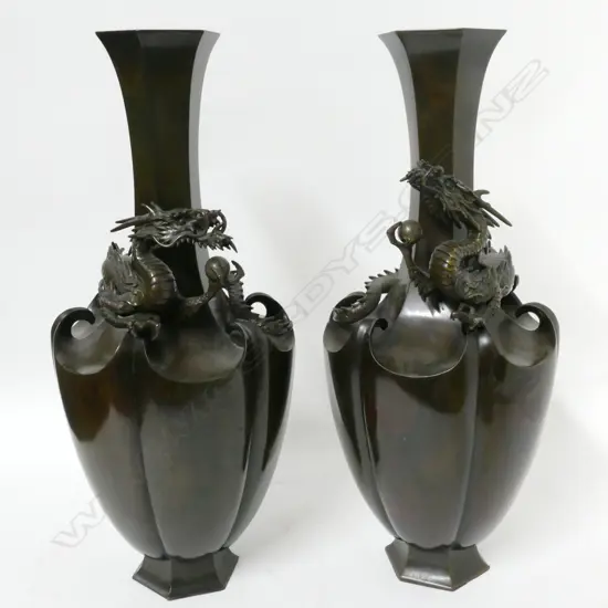 A pair of Japanese Meiji period bronze vases