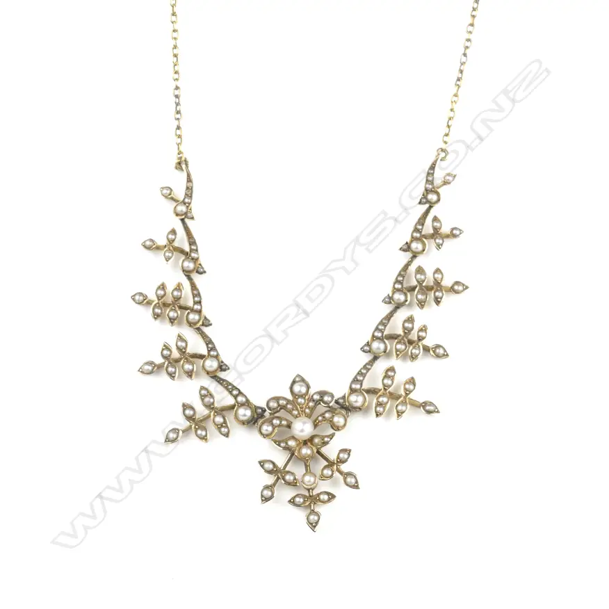 An Edwardian 9ct gold and seed pearl necklace Image 1++