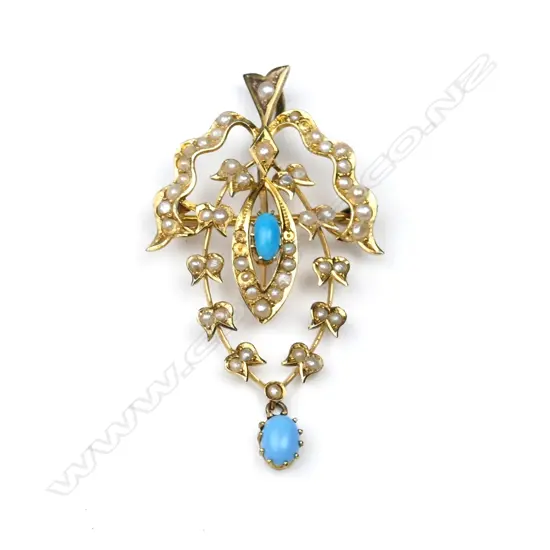 An Edwardian 9ct. gold pendant/brooch