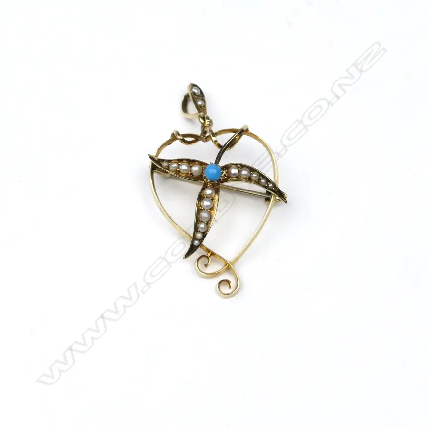 An Edwardian 15ct gold pendant Image 1++