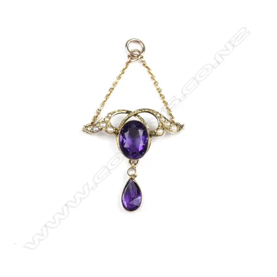 An Edwardian 9ct. yellow gold amethyst and seed pearl pendant