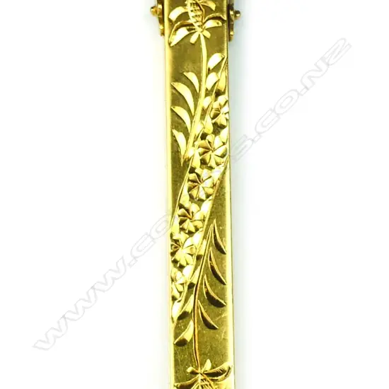 A 20ct. gold toothpick holder