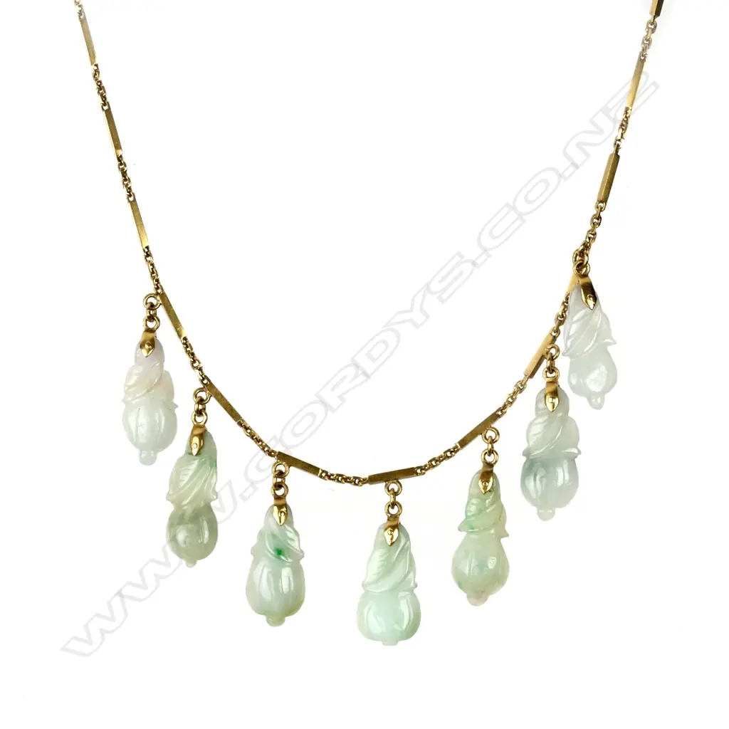 A 20ct. gold and jade necklace Image 1++