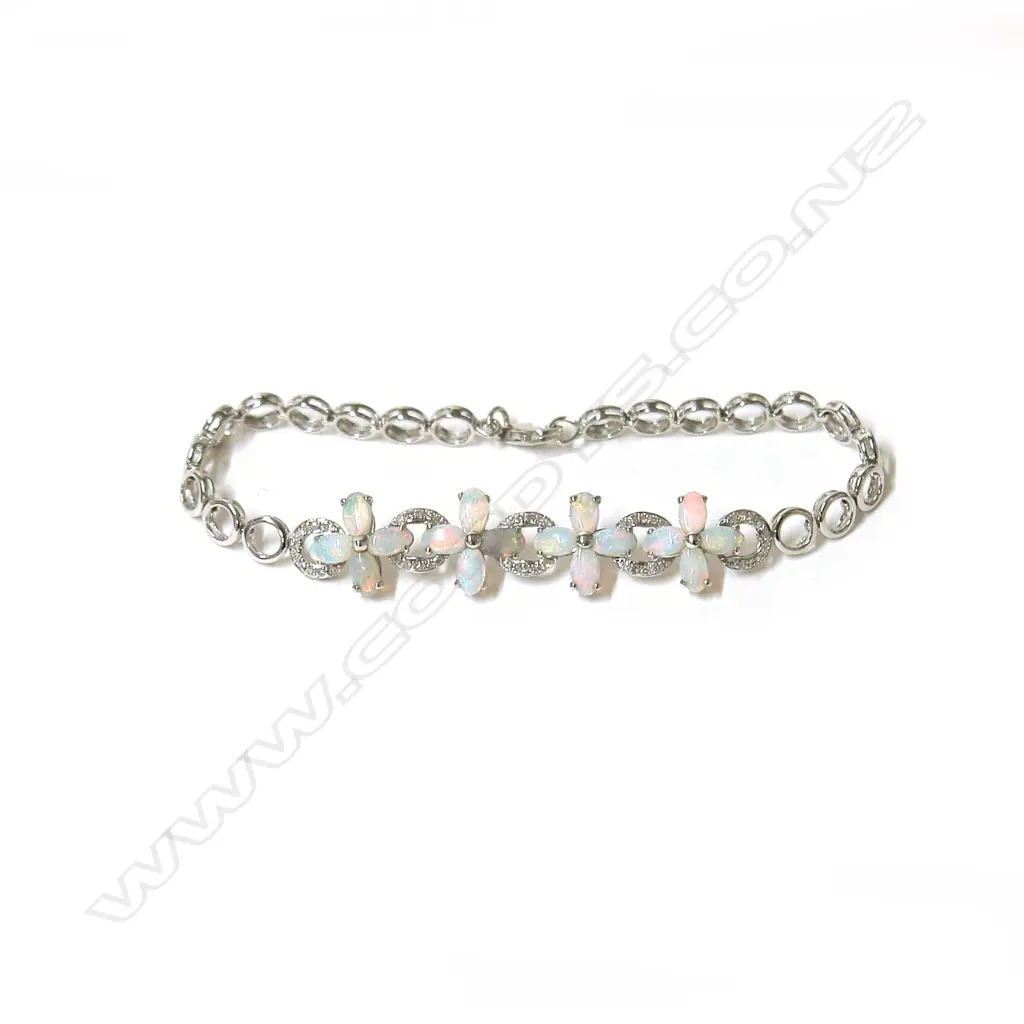 An 18ct. white gold opal and diamond bracelet Image 1++