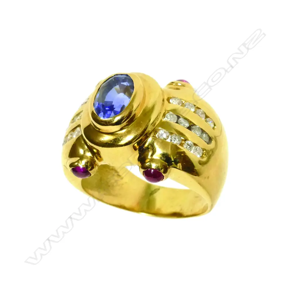 A Cartier inspired 18ct yellow gold ring set with a sapphire Image 1++