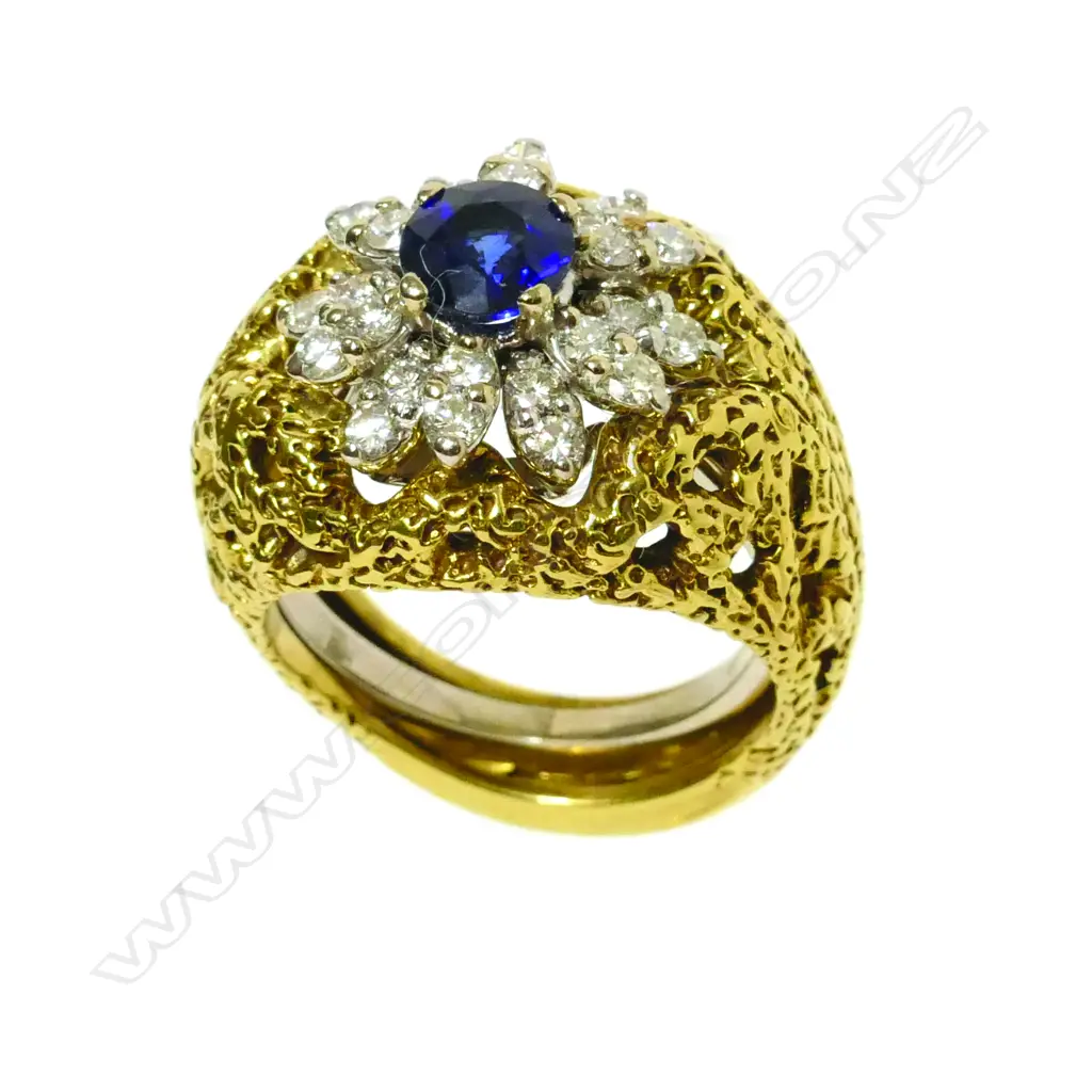 A sapphire and diamond cluster ring with an option to wear fitted inside an 18ct yellow gold frame Image 1++