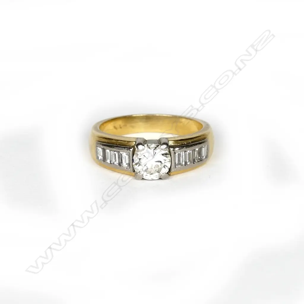 An 18ct. gold diamond ring Image 1++
