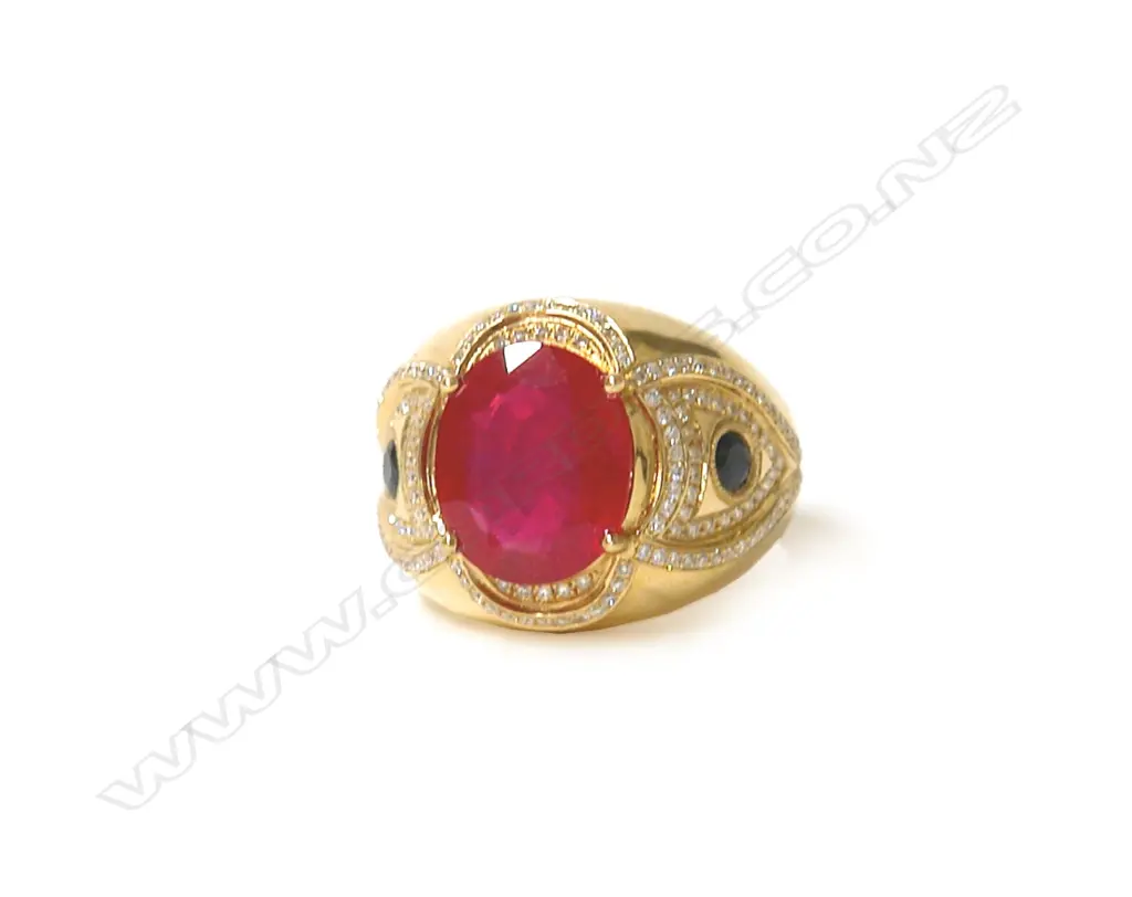A substantial modern 18ct. yellow gold ruby diamond and sapphire dress ring Image 1++