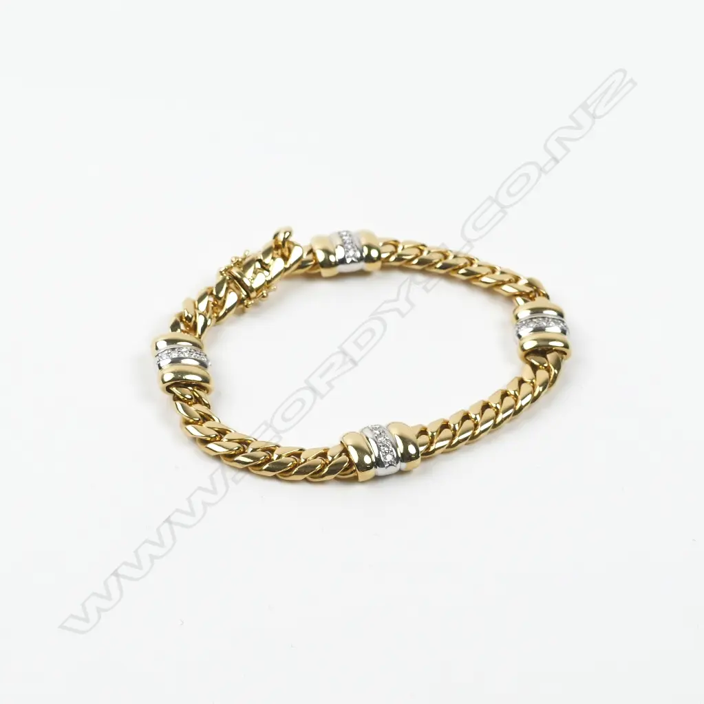 A heavy 18ct. gold and diamond bracelet Image 1++