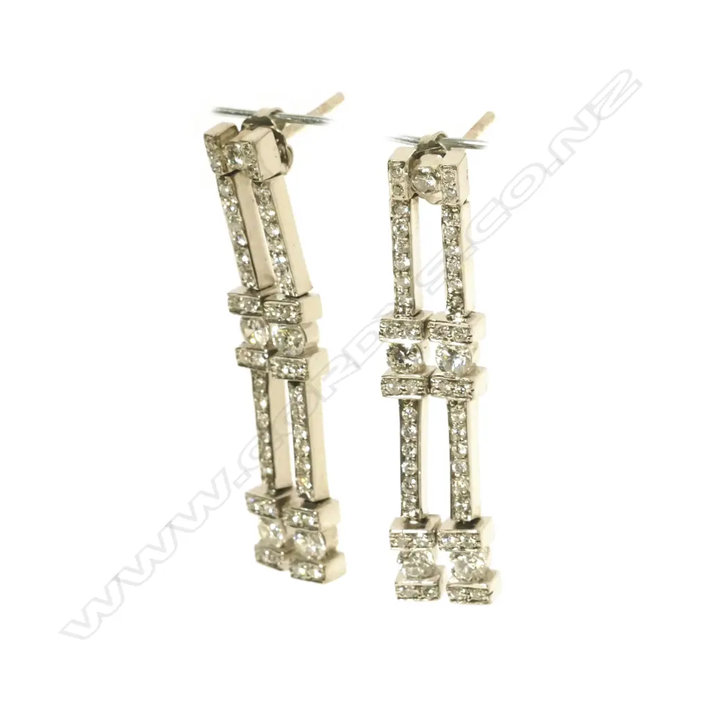 A pair of 18ct. white gold and diamond drop earrings Image 1++